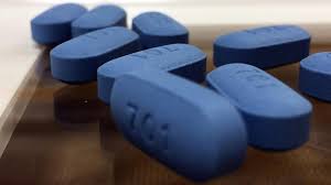 close up photo of blue pills