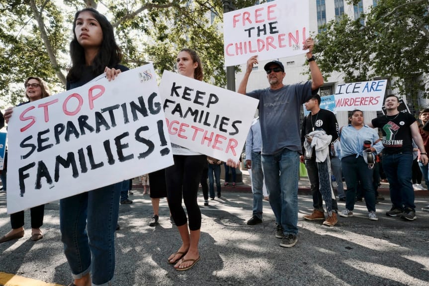 Protestors attend a march against family separation at the border in Los Angeles on June 26, 2018