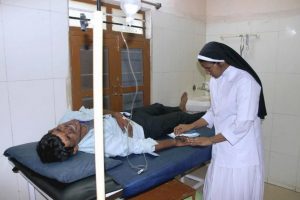 nun installs an IV