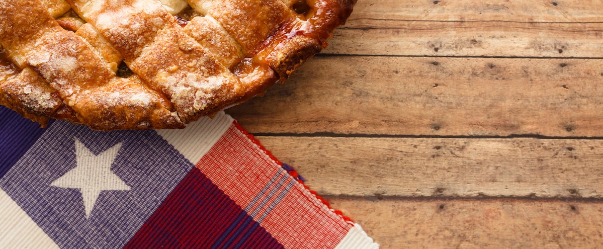 Latice crust apple pie on a red, white and blue theme