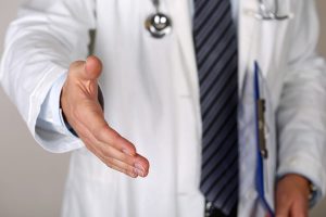 Doctor greeting hands