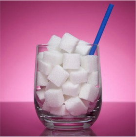 Sugar cubes in glass