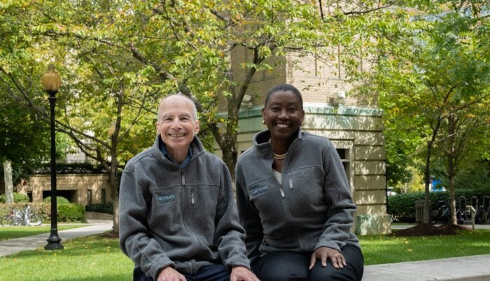 Larry Gostin and Michele Goodwin on the GULC campus